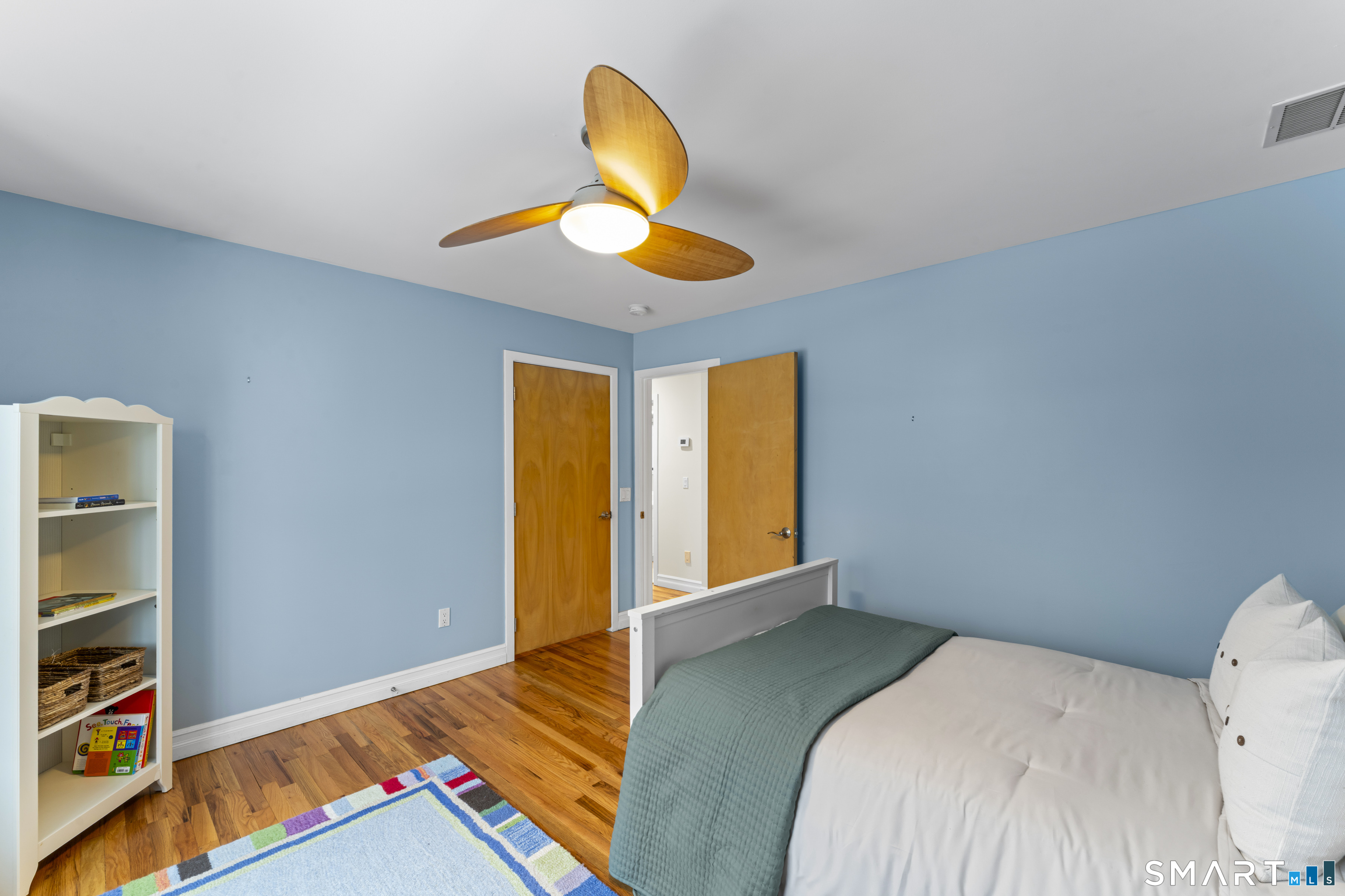 211 Pinewood Road Stamford, CT 06903 - Photo 25 of 38 a bedroom with a bed and a large window