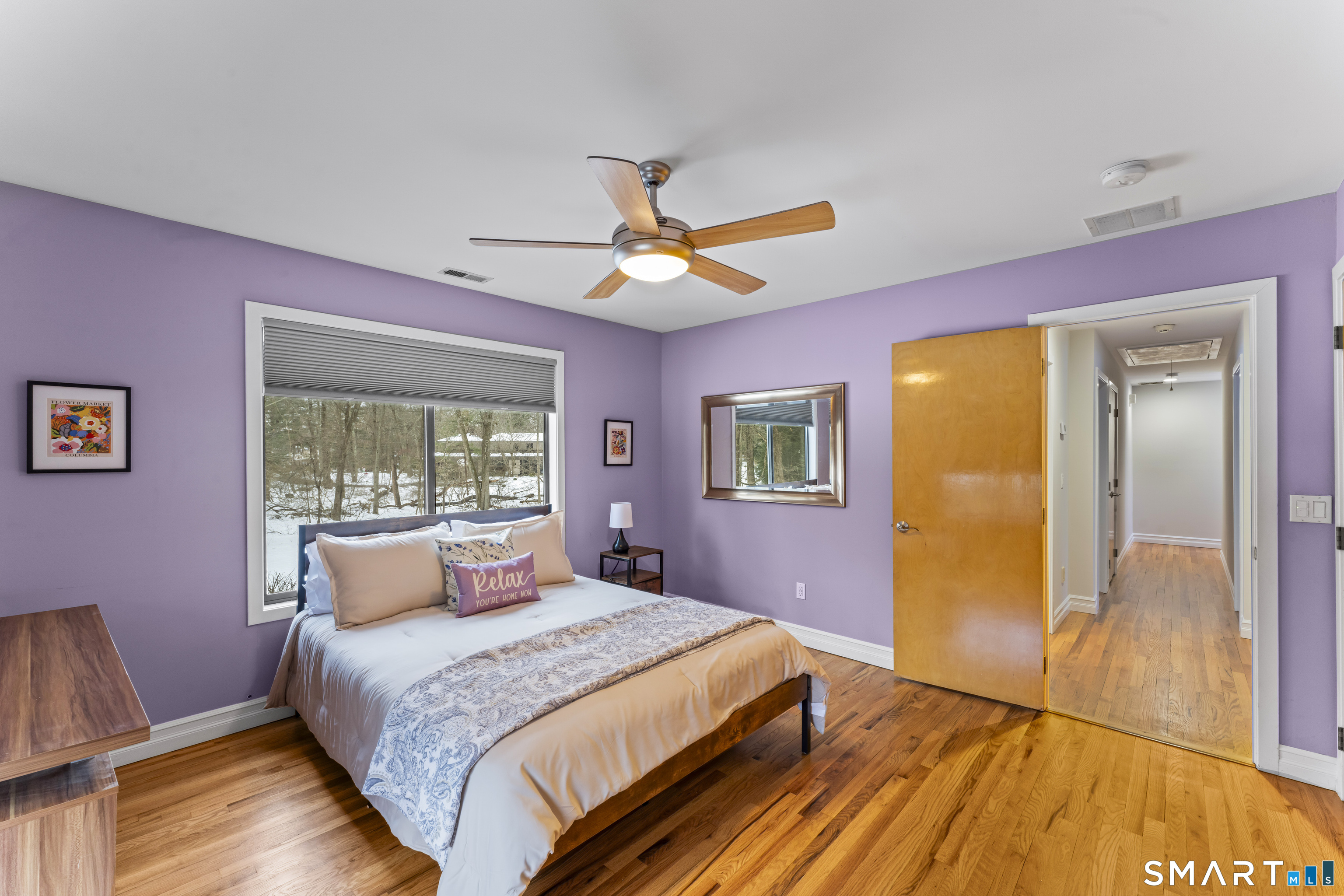 211 Pinewood Road Stamford, CT 06903 - Photo 26 of 38 a bedroom with a bed and a potted plant