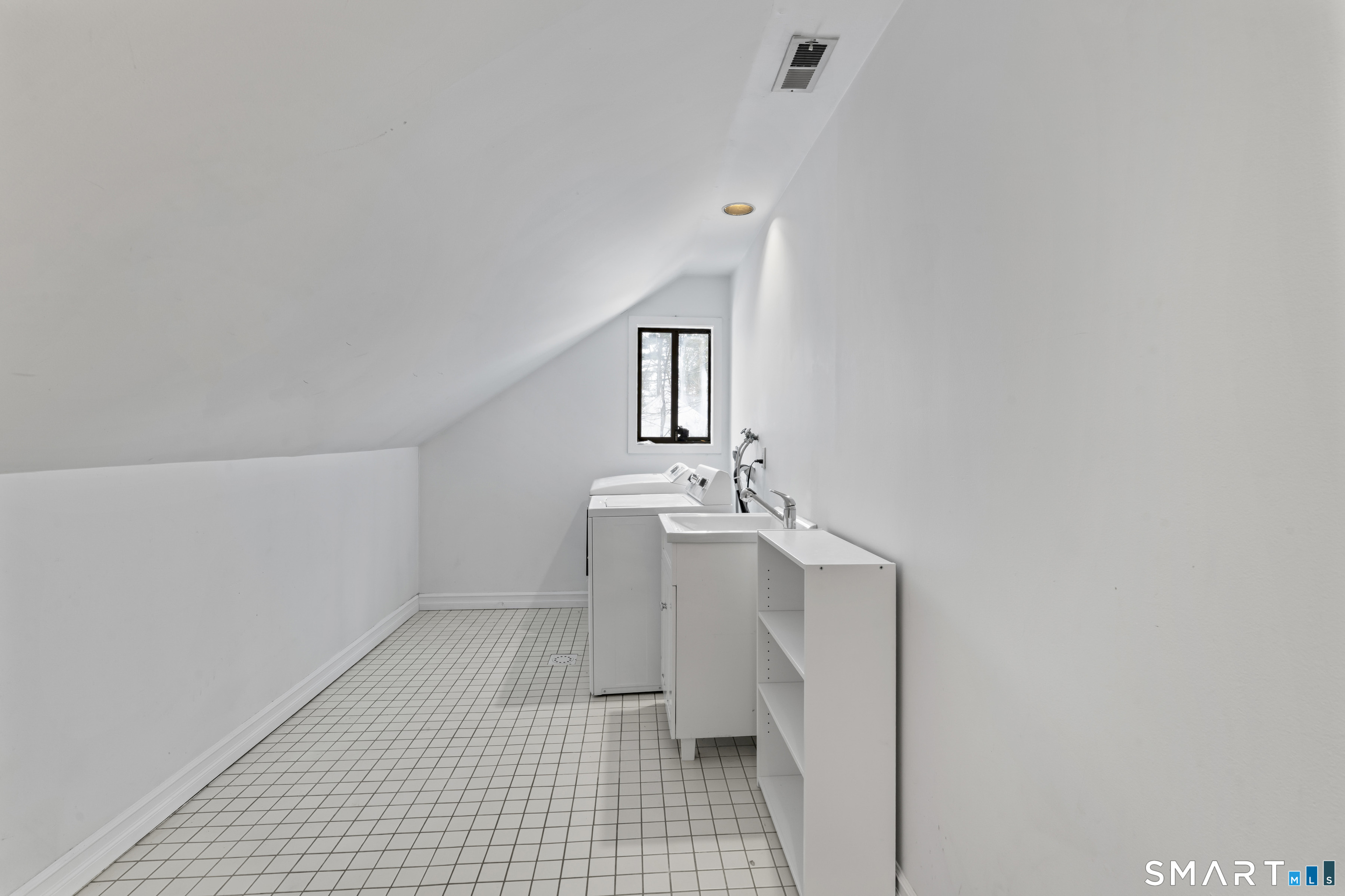 211 Pinewood Road Stamford, CT 06903 - Photo 31 of 38 a bathroom with a sink a toilet and mirror