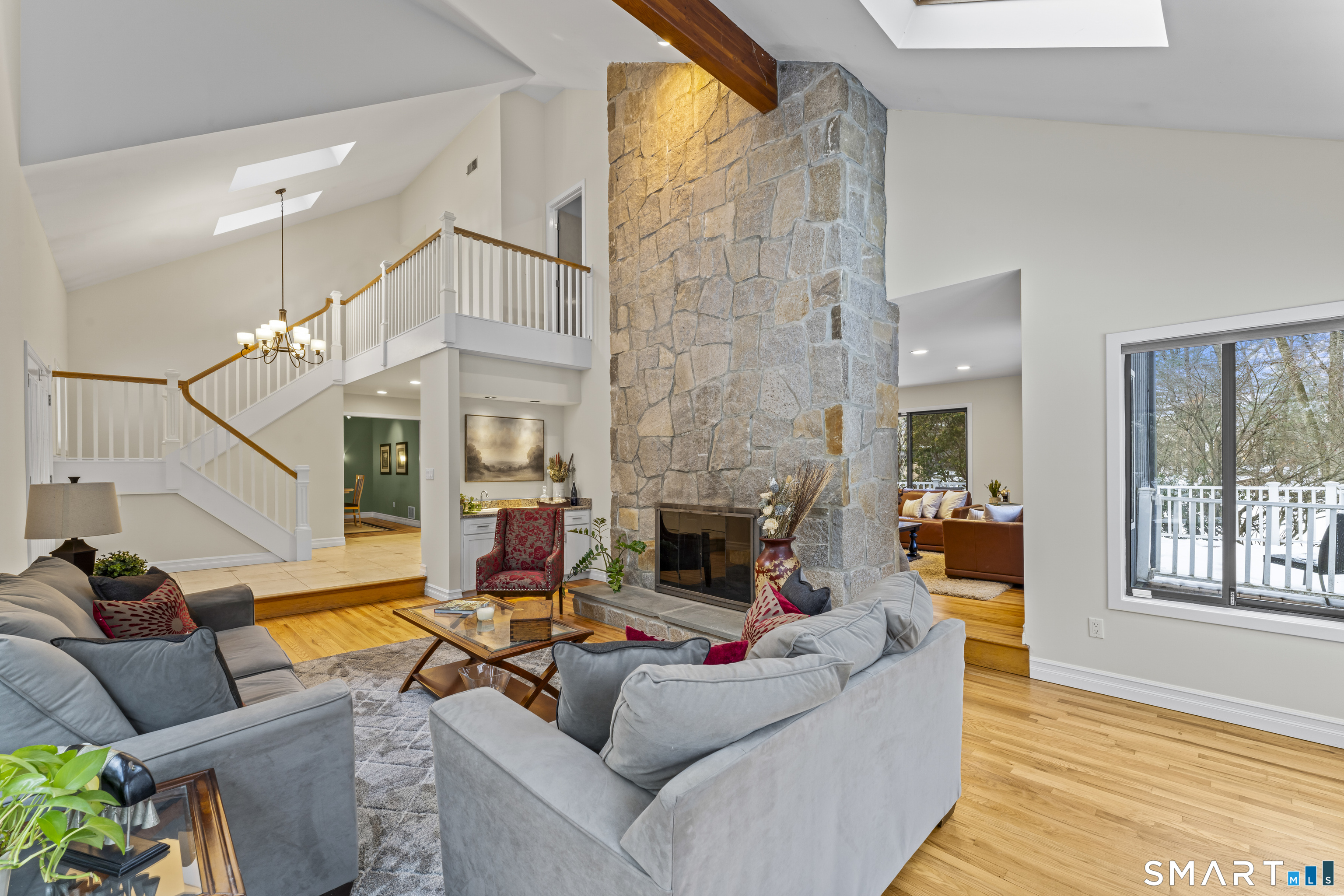 211 Pinewood Road Stamford, CT 06903 - Photo 4 of 38 a living room with furniture fireplace and a window