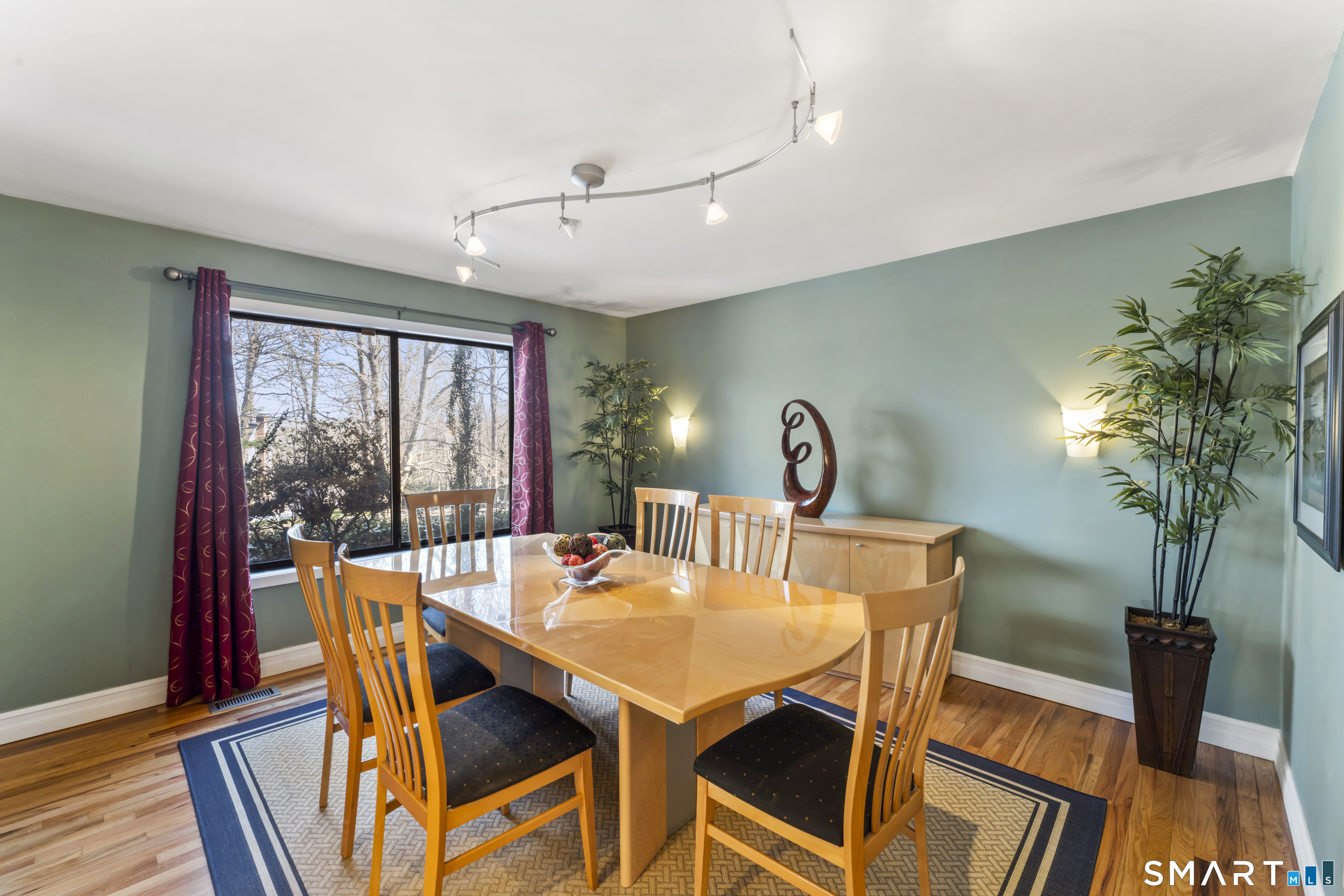 211 Pinewood Road Stamford, CT 06903 - Photo 8 of 38 a view of a dining room with furniture window and wooden floor