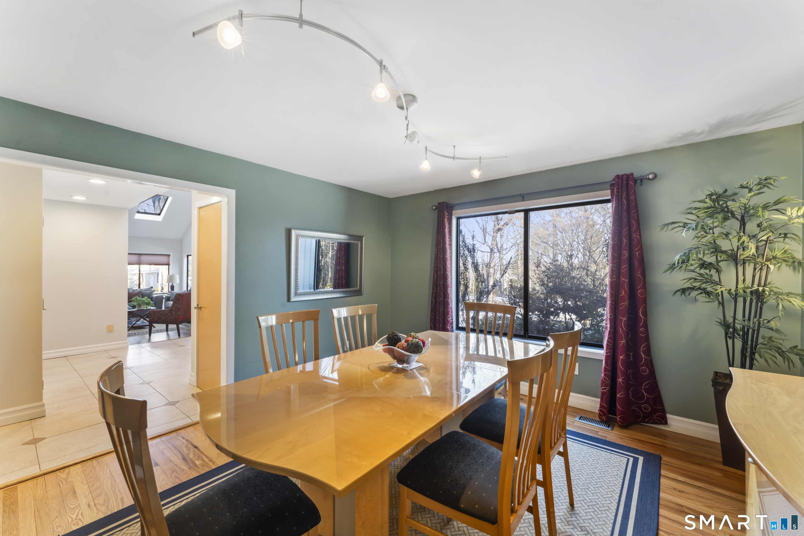 211 Pinewood Road Stamford, CT 06903 - Photo 9 of 38 a view of a dining room with furniture window and wooden floor