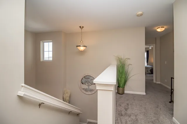 a view of empty room with window and entryway