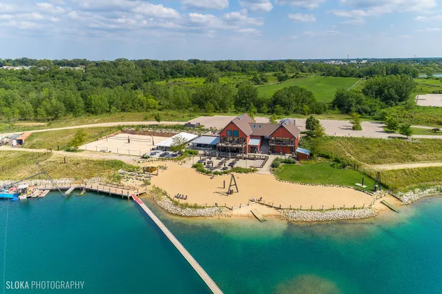 a view of a lake with a yard