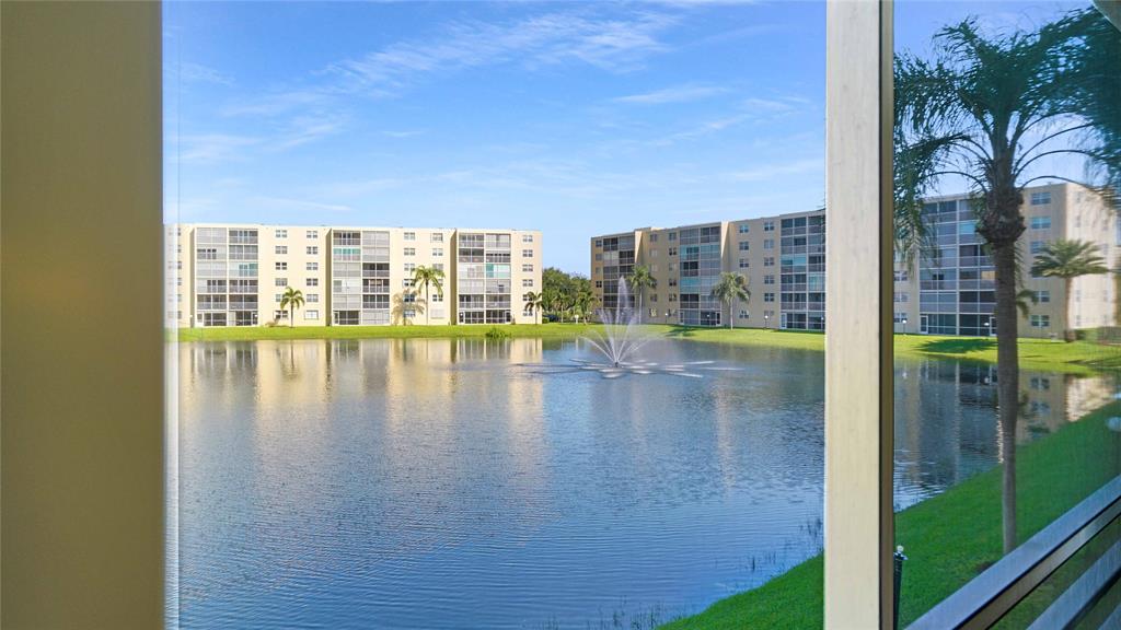 a view of swimming pool from a lake view