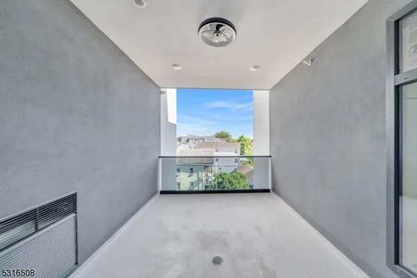 a view of room with window and closet