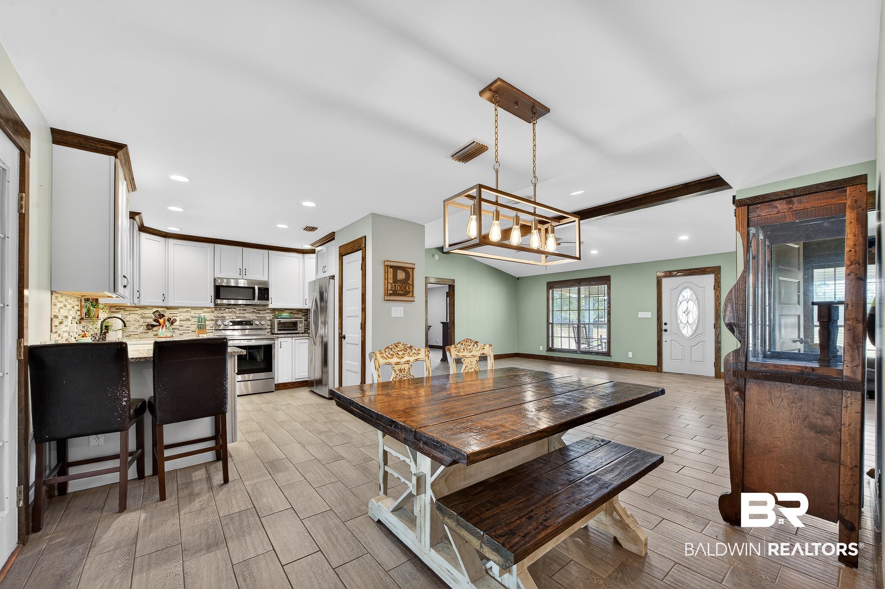 29635 Gardner Road Elberta, AL 36530 - Photo 18 of 66 Dining room with wood finish floors and recessed lighting