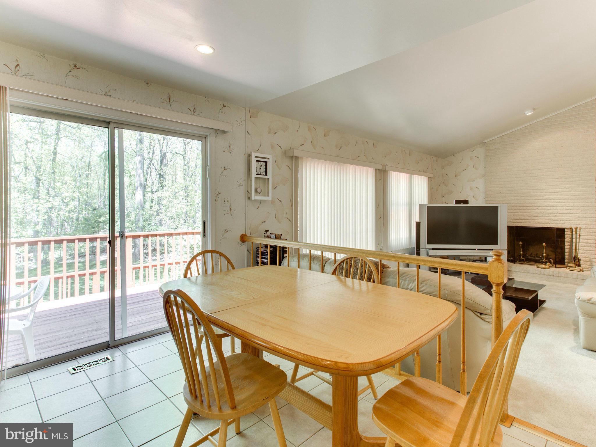 10 Deckman Court Silver Spring, MD 20906 - Photo 11 of 25 a dining room with furniture and window