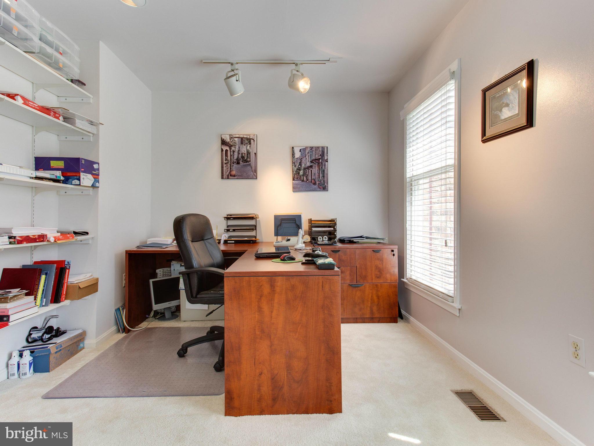 10 Deckman Court Silver Spring, MD 20906 - Photo 3 of 25 a view of a livingroom with furniture and a window