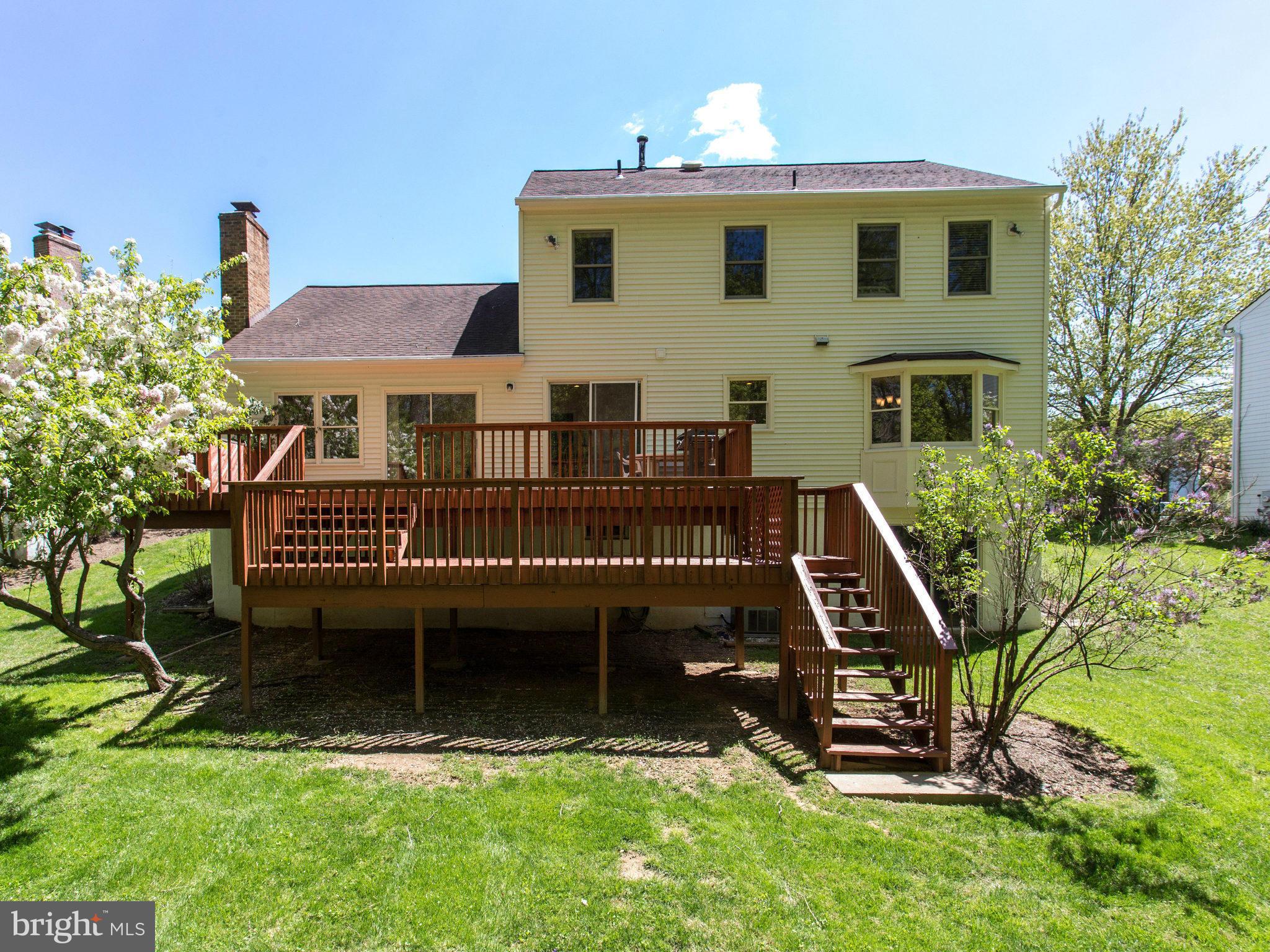 10 Deckman Court Silver Spring, MD 20906 - Photo 24 of 25 a view of a house with backyard and sitting area