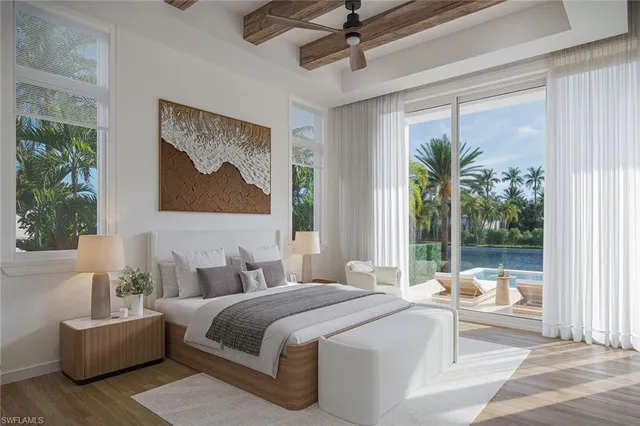 a spacious bedroom with a large bed and a window