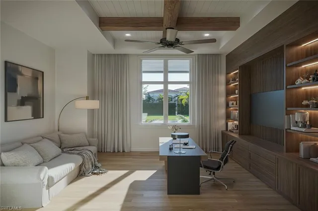 a living room with furniture and a window