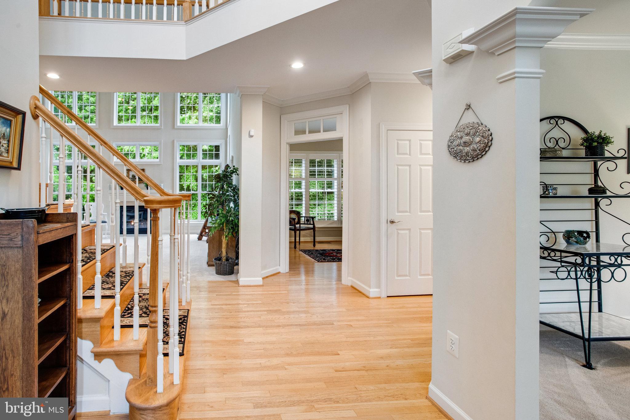 18565 Kerill Road Triangle, VA 22172 - Photo 15 of 59 a view of entryway with workspace and stairs