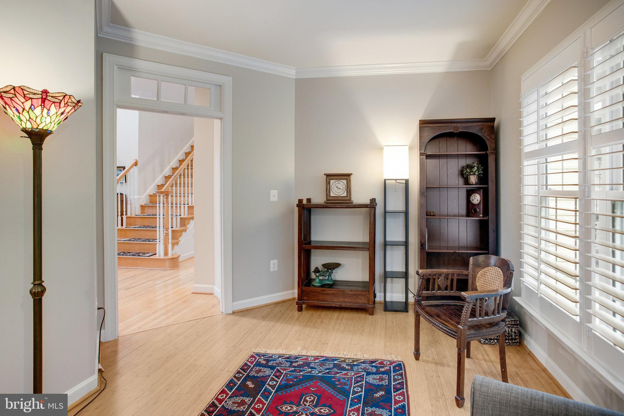 18565 Kerill Road Triangle, VA 22172 - Photo 23 of 59 a view of a livingroom with a workspace