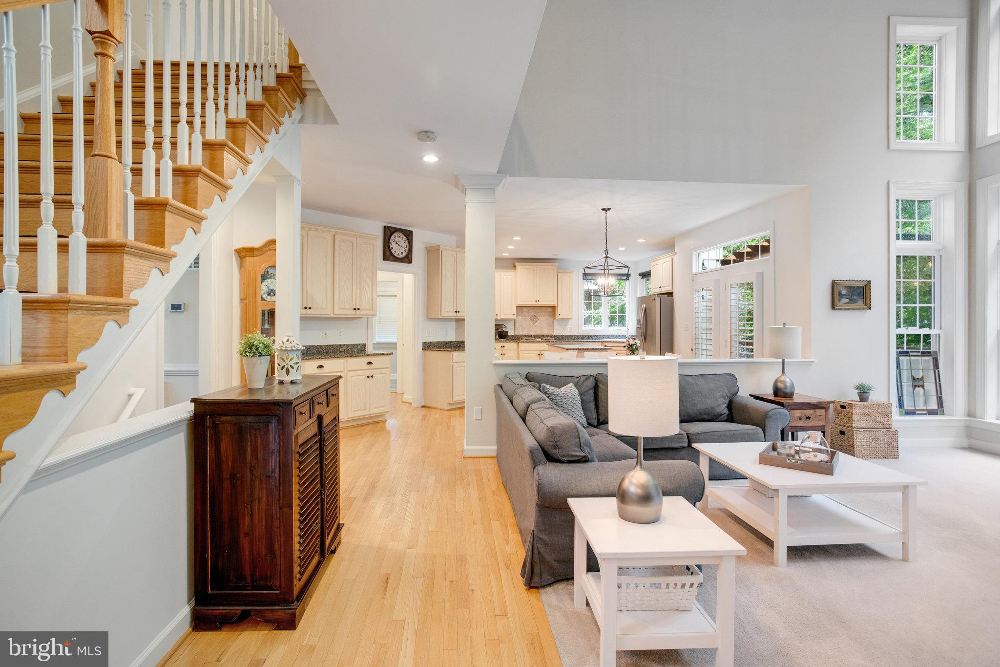 18565 Kerill Road Triangle, VA 22172 - Photo 29 of 59 a living room with fireplace furniture and a wooden floor