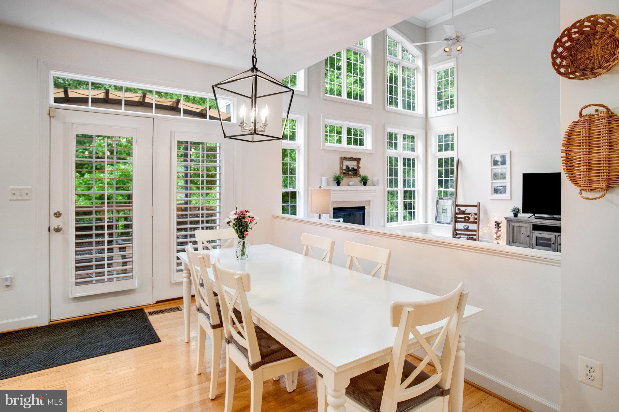 18565 Kerill Road Triangle, VA 22172 - Photo 30 of 59 a view of a dining room with furniture window and outside view
