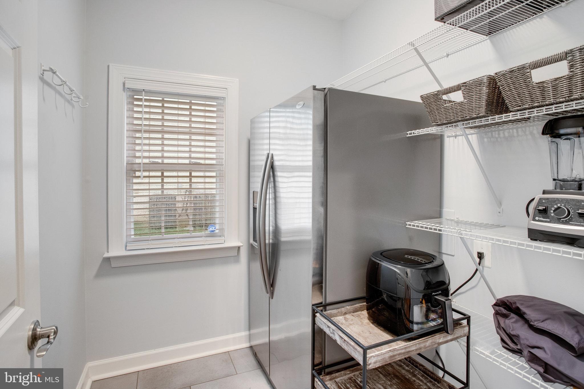 18565 Kerill Road Triangle, VA 22172 - Photo 35 of 59 a living room with furniture and a window