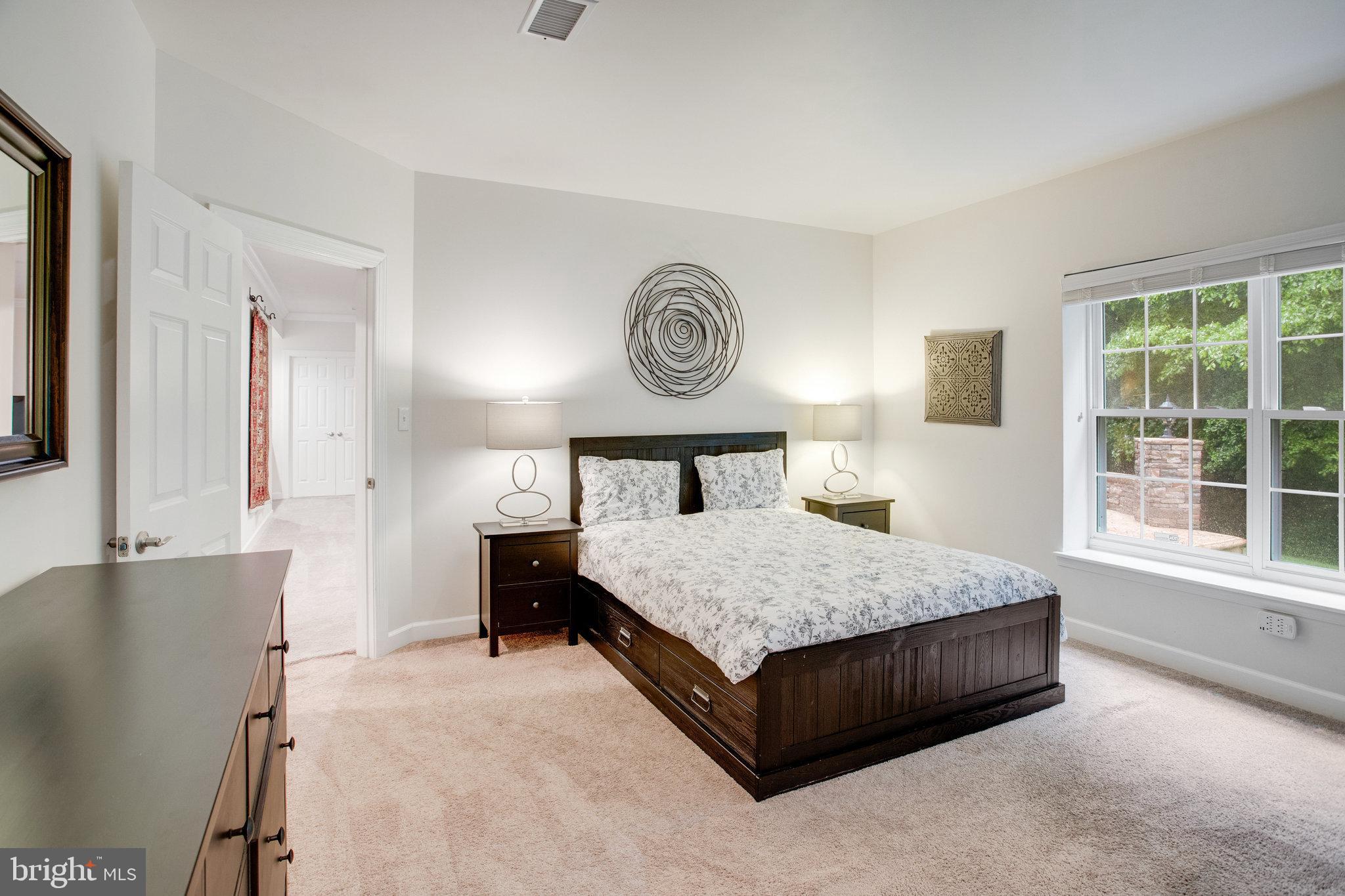 18565 Kerill Road Triangle, VA 22172 - Photo 49 of 59 a bedroom with a bed and a window