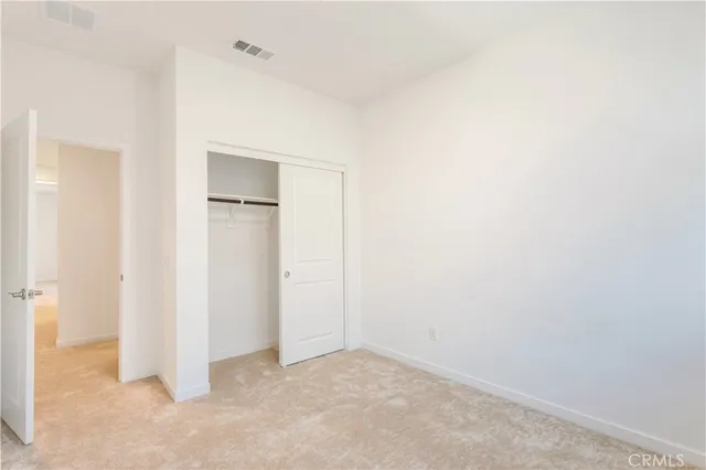 a dining table with chairs and palm tree