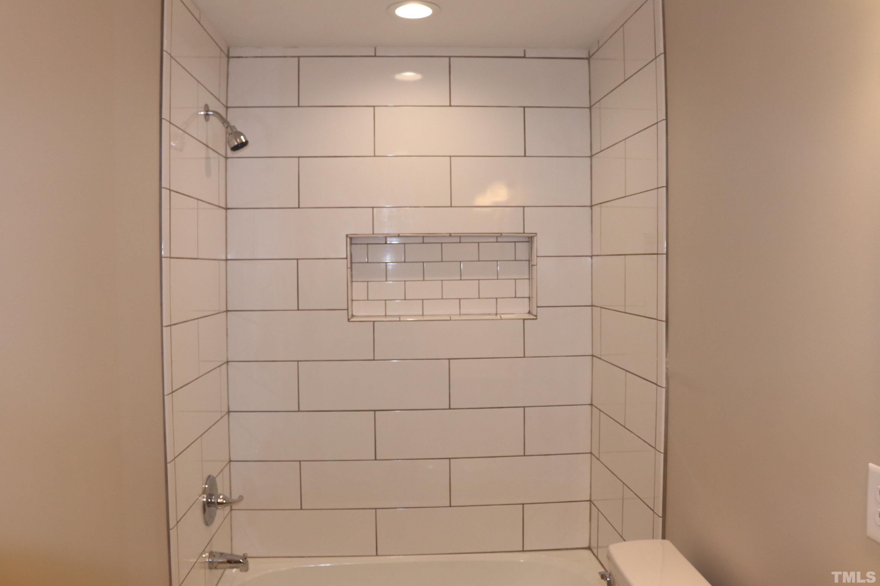 1108 Wyldewood Road Durham, NC 27704 - Photo 21 of 35 a bathroom with a shower