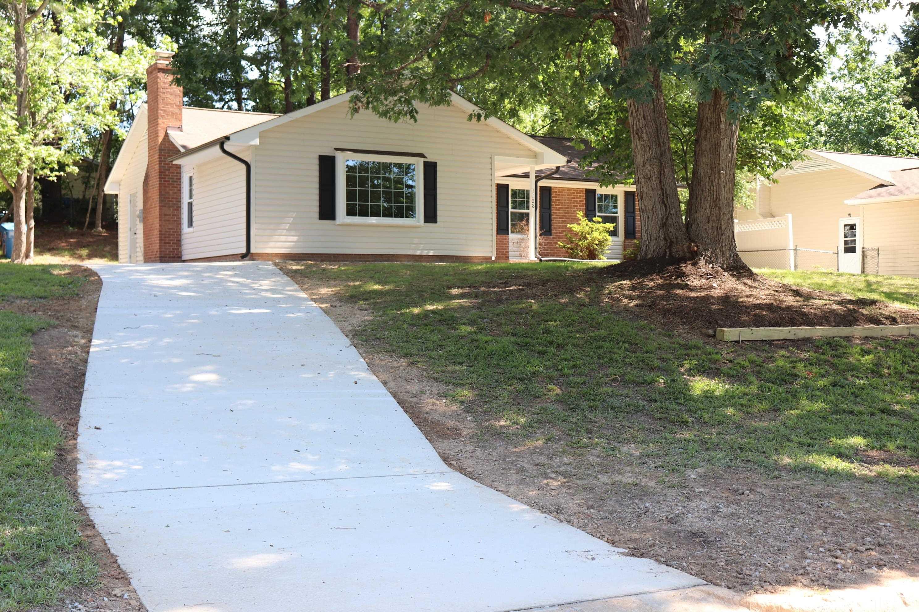 1108 Wyldewood Road Durham, NC 27704 - Photo 3 of 35 a view of a house with a yard