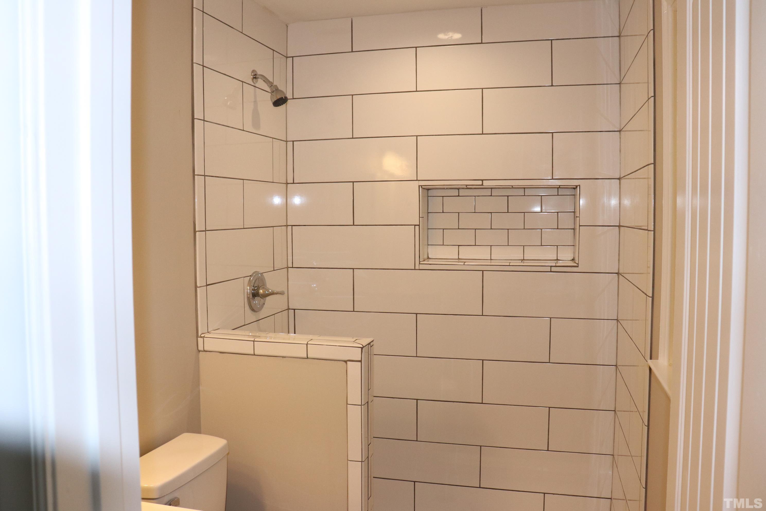 1108 Wyldewood Road Durham, NC 27704 - Photo 31 of 35 a bathroom with a shower