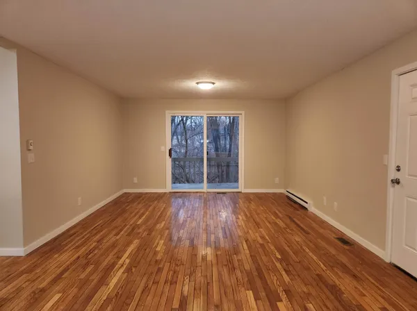 a bathroom with a toilet and a bathtub