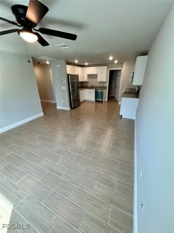 a view of kitchen with a sink