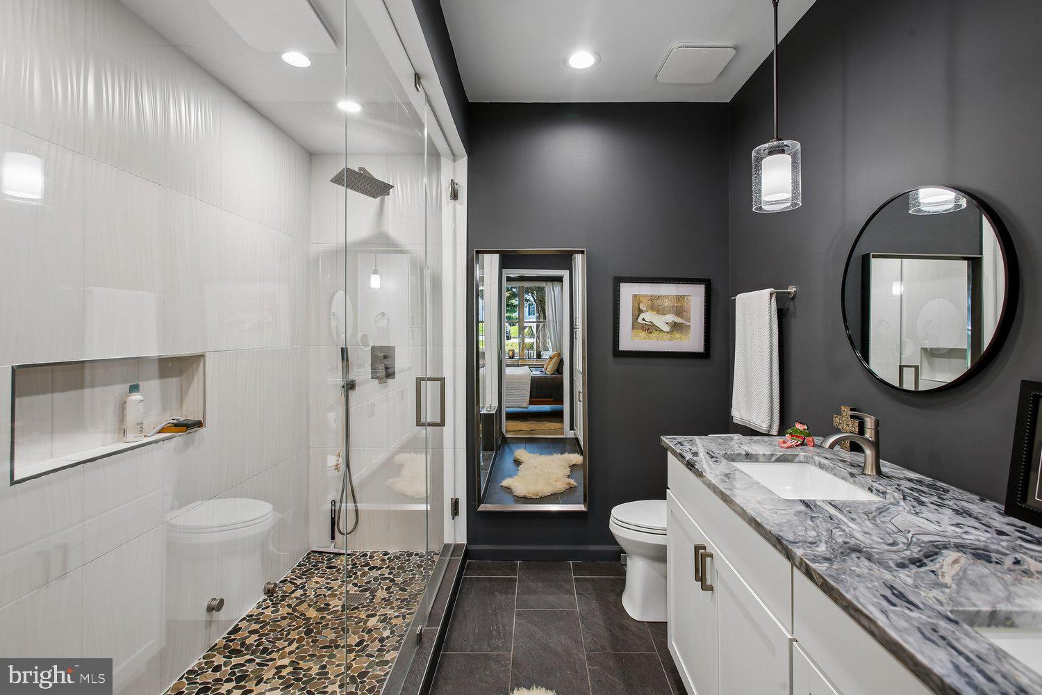 1855 Stratford Park Place, Unit 103 Reston, VA 20190 - Photo 25 of 49 Primary Bath with incredible steamed shower.