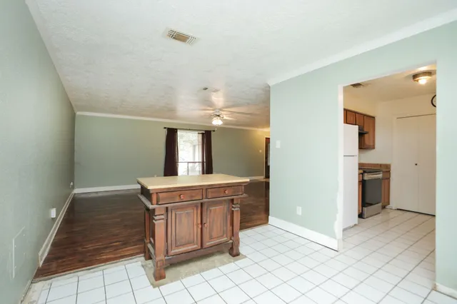 a view of a kitchen with a sink
