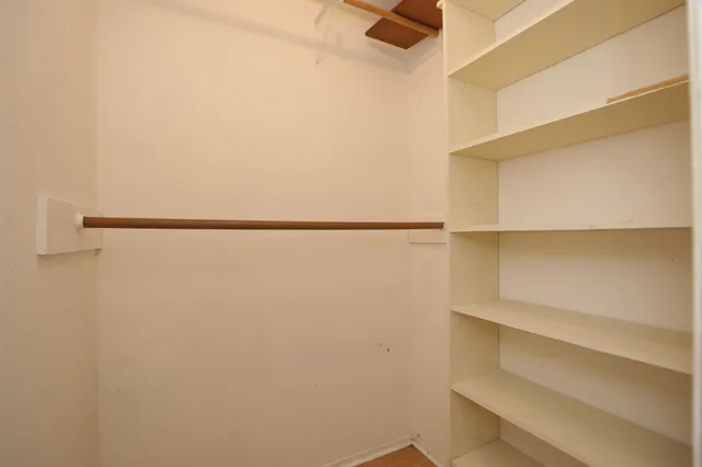 a view of small space with racks on the wall