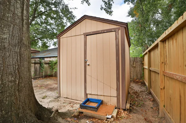 a backyard of a house with seating space