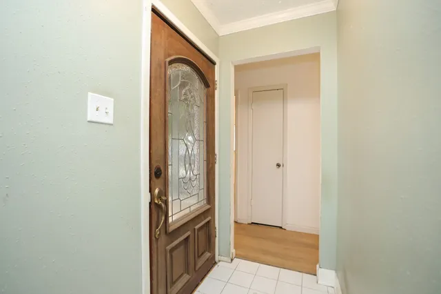 a view of a bathroom from the hallway