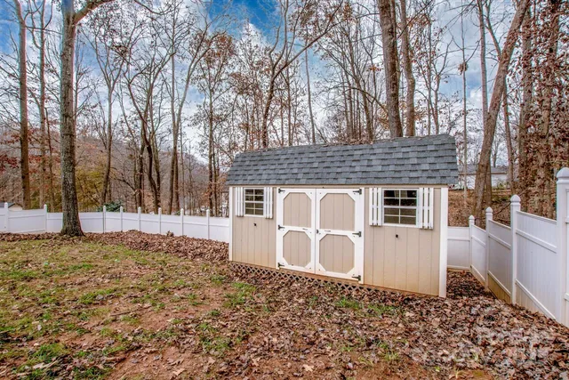 a backyard of a house with lots of green space