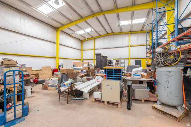 555 East S Nichols Peak Road Washington, UT 84780 - Photo 8 of 20 Garage featuring a workshop area