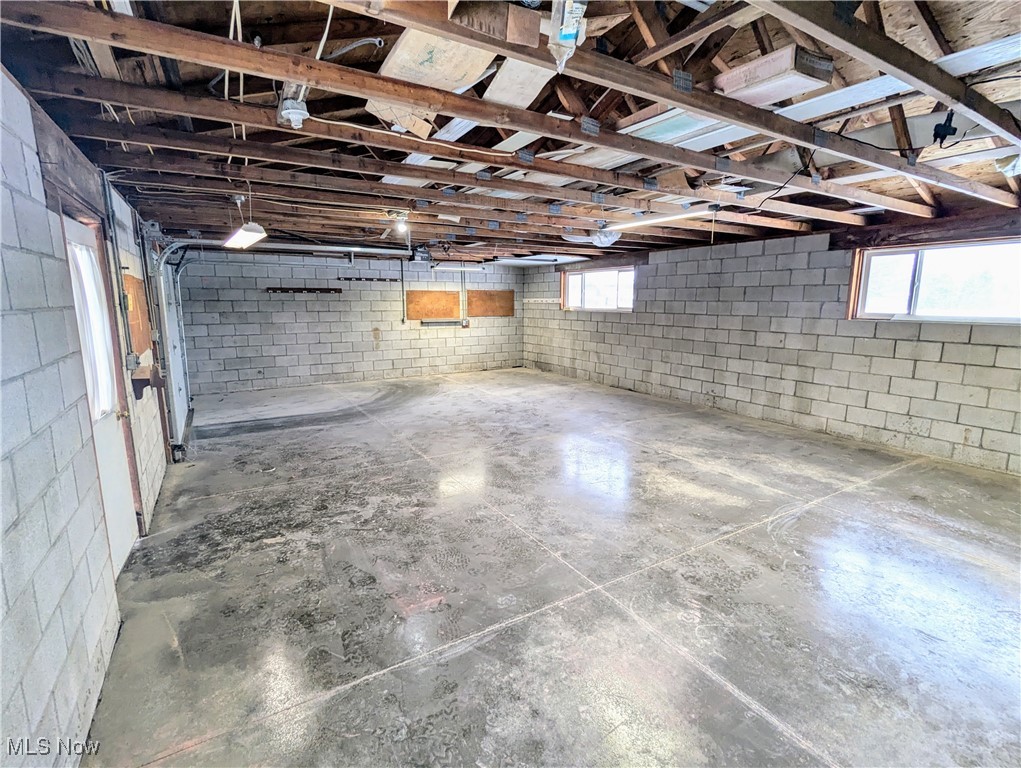 8011 Patten Tract Road Sandusky, OH 44870 - Photo 35 of 36 3rd car garage
new concrete floor