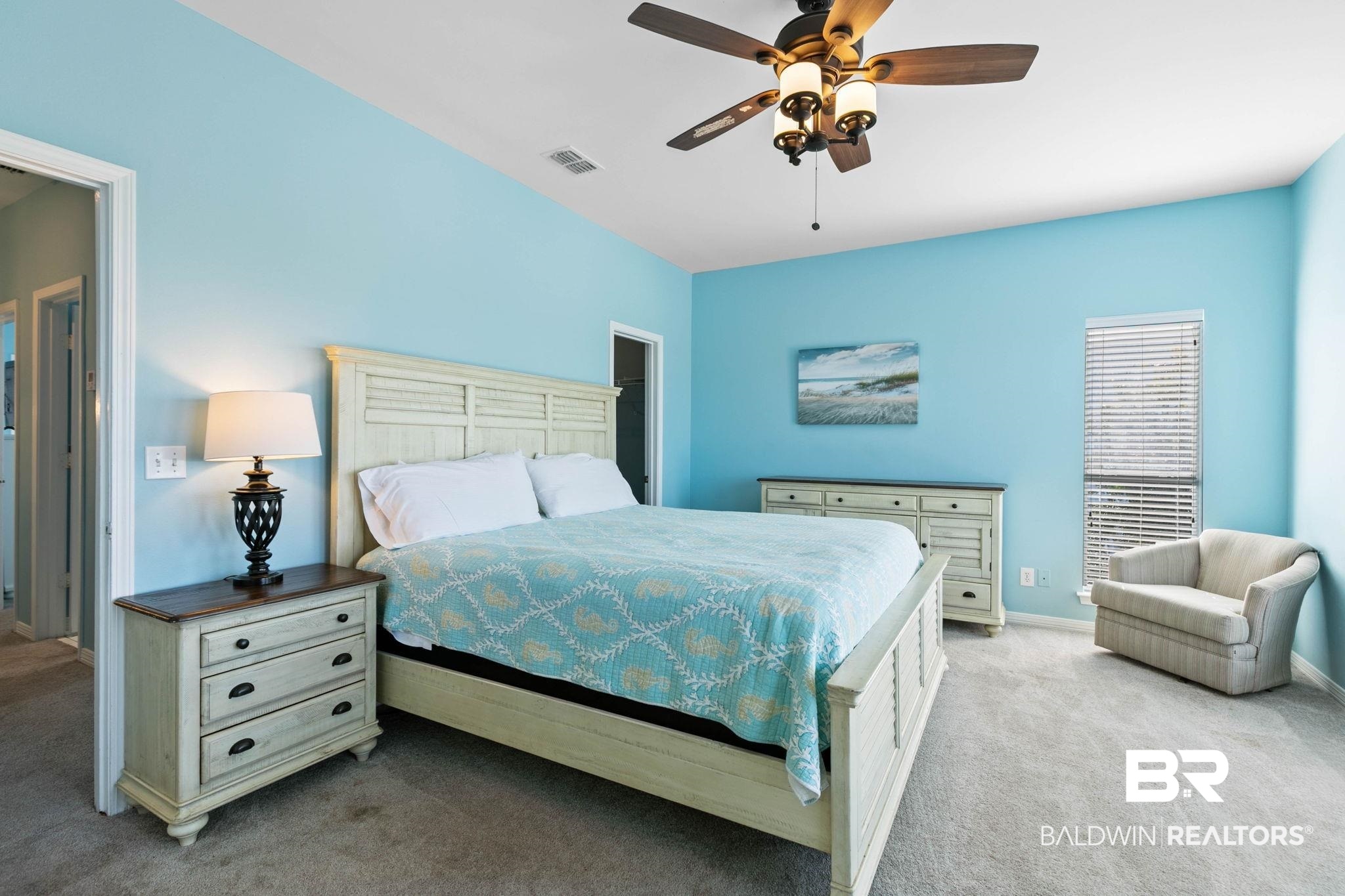 545 Plantation Road, Unit 3 Gulf Shores, AL 36542 - Photo 23 of 54 Bedroom with light colored carpet and ceiling fan
