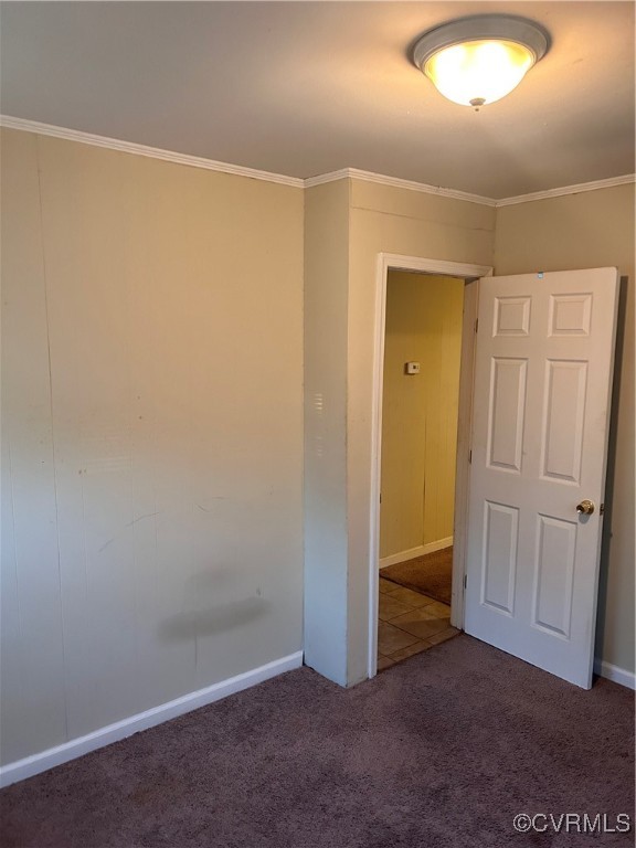 445 Smiley Road Hampton, VA 23663 - Photo 5 of 8 Empty room with dark colored carpet and crown mold