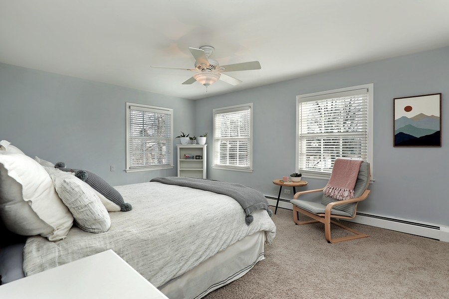 2915 Shannon Road Northbrook, IL 60062 - Photo 18 of 33 a bedroom with a bed chair and window