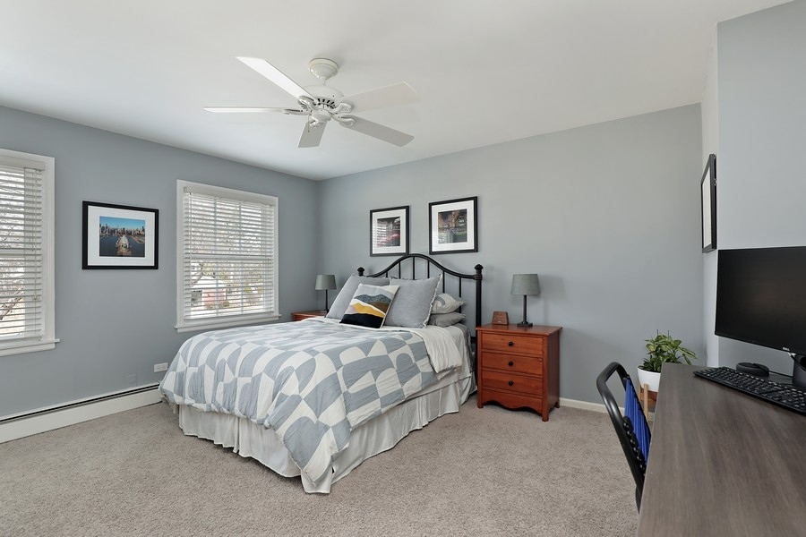 2915 Shannon Road Northbrook, IL 60062 - Photo 20 of 33 a bedroom with a bed and a flat screen tv
