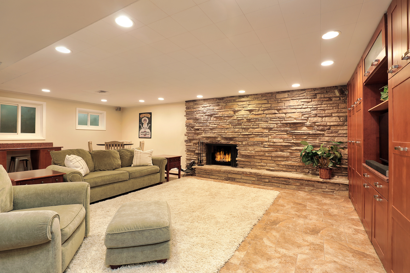 2915 Shannon Road Northbrook, IL 60062 - Photo 21 of 33 a living room with fireplace furniture and a flat screen tv