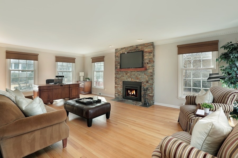 2915 Shannon Road Northbrook, IL 60062 - Photo 4 of 33 a living room with furniture and a fireplace