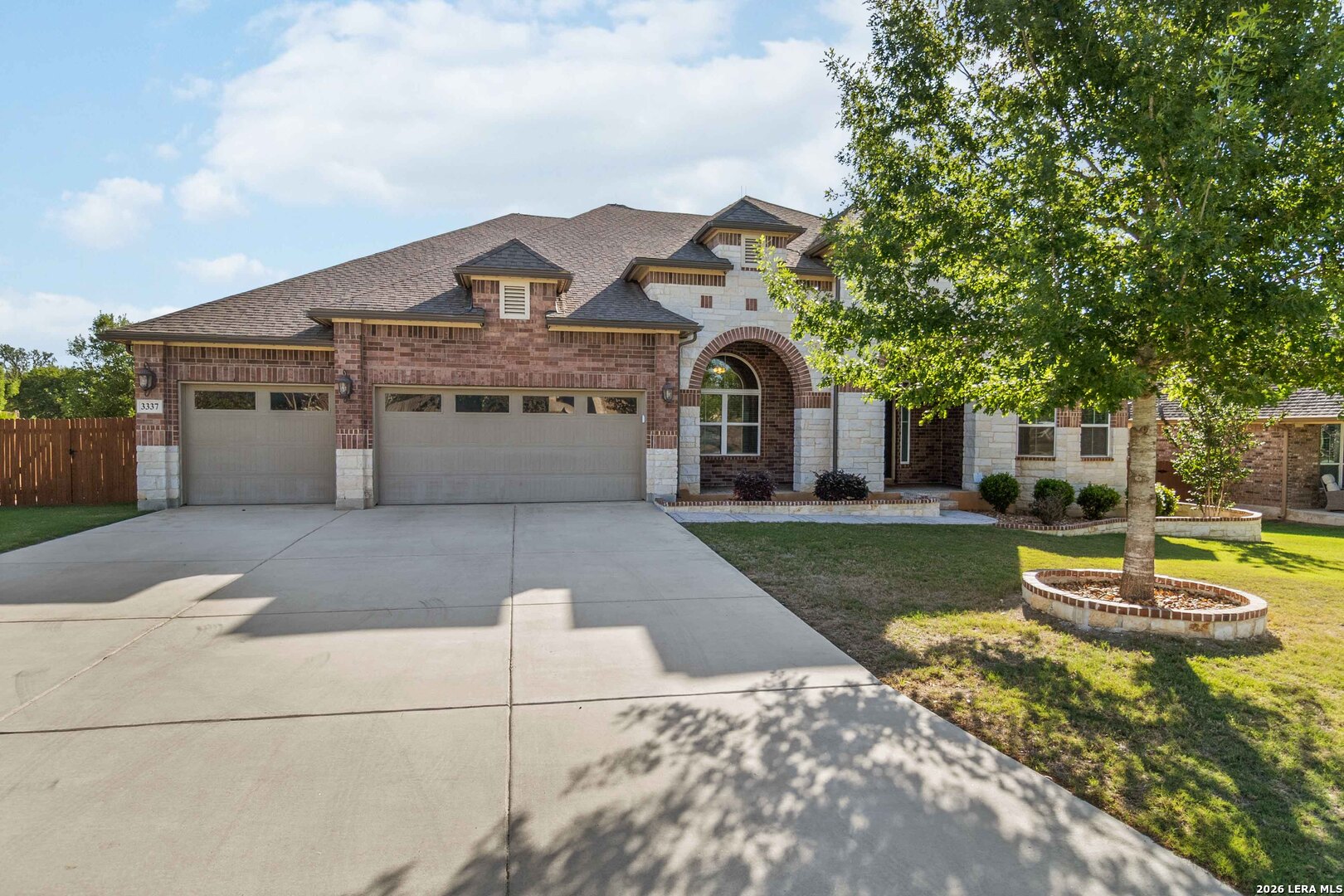 3337 Harvest View Marion, TX 78124 - Photo 1 of 39 a front view of a house with a yard and garage