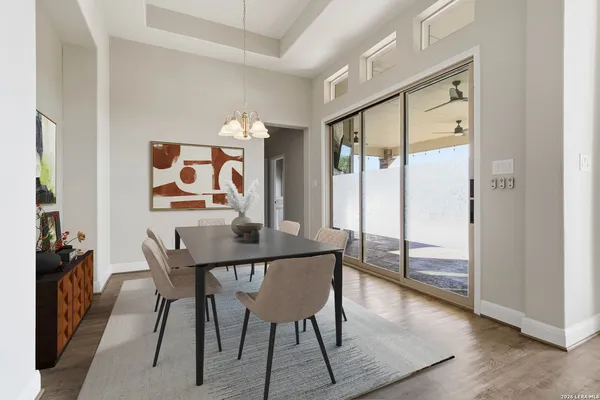 a view of an empty room with glass door