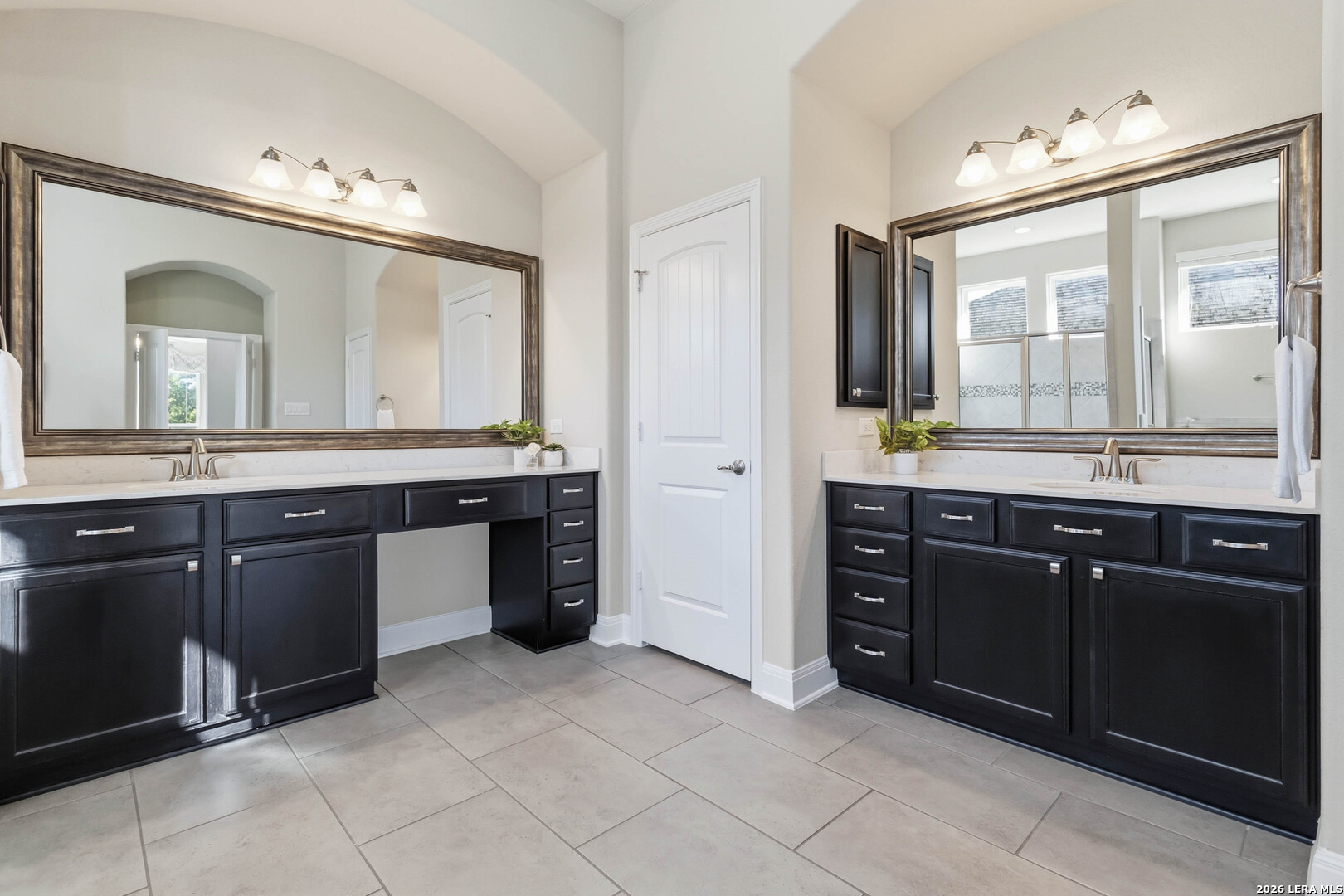 3337 Harvest View Marion, TX 78124 - Photo 16 of 39 a spacious bathroom with a granite countertop sink and a mirror
