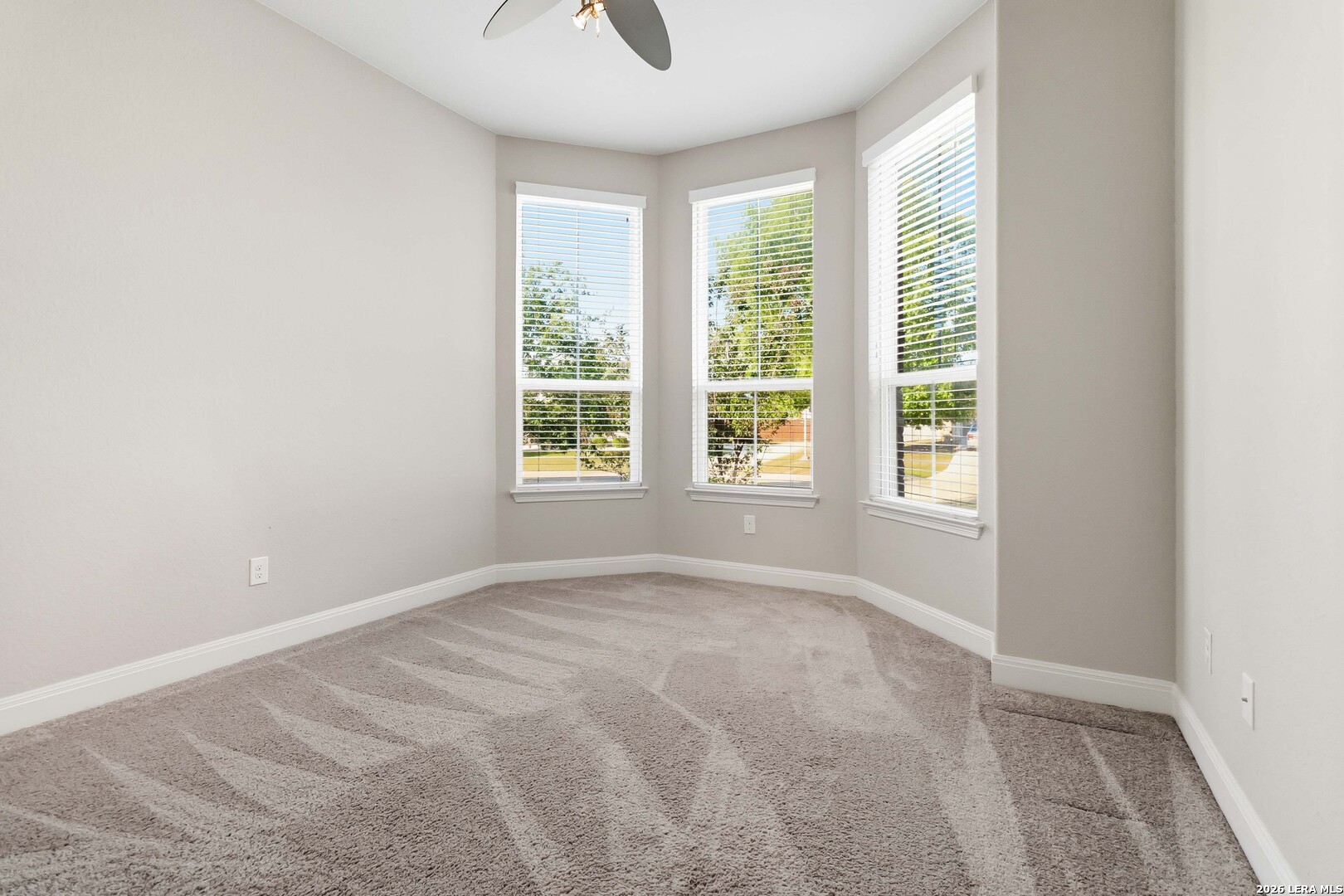 3337 Harvest View Marion, TX 78124 - Photo 21 of 39 an empty room with windows