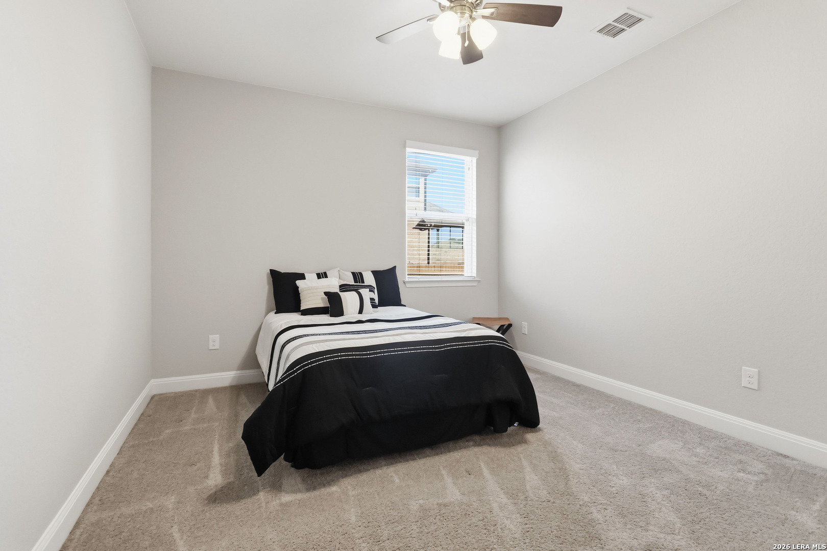 3337 Harvest View Marion, TX 78124 - Photo 24 of 39 a bedroom with a bed and window