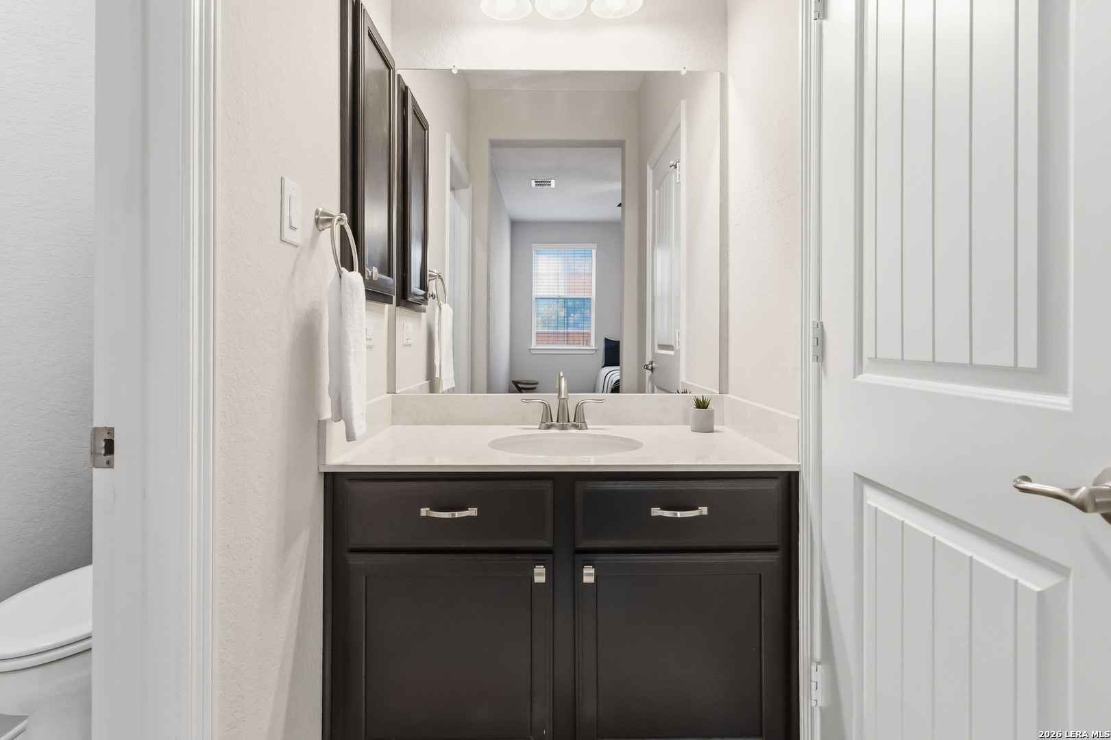 3337 Harvest View Marion, TX 78124 - Photo 26 of 39 a bathroom with a sink and a mirror