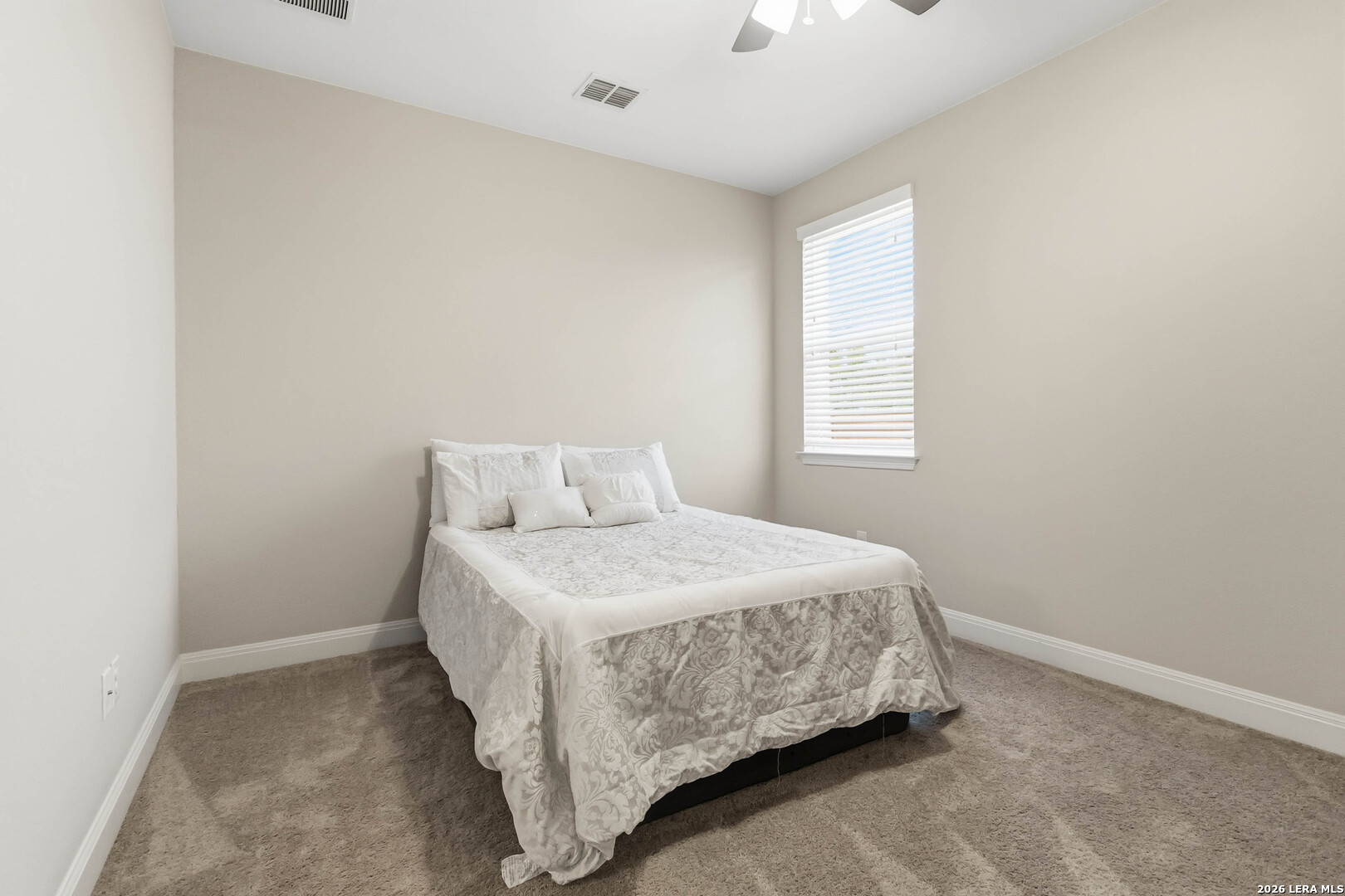 3337 Harvest View Marion, TX 78124 - Photo 29 of 39 a bedroom with a bed and window