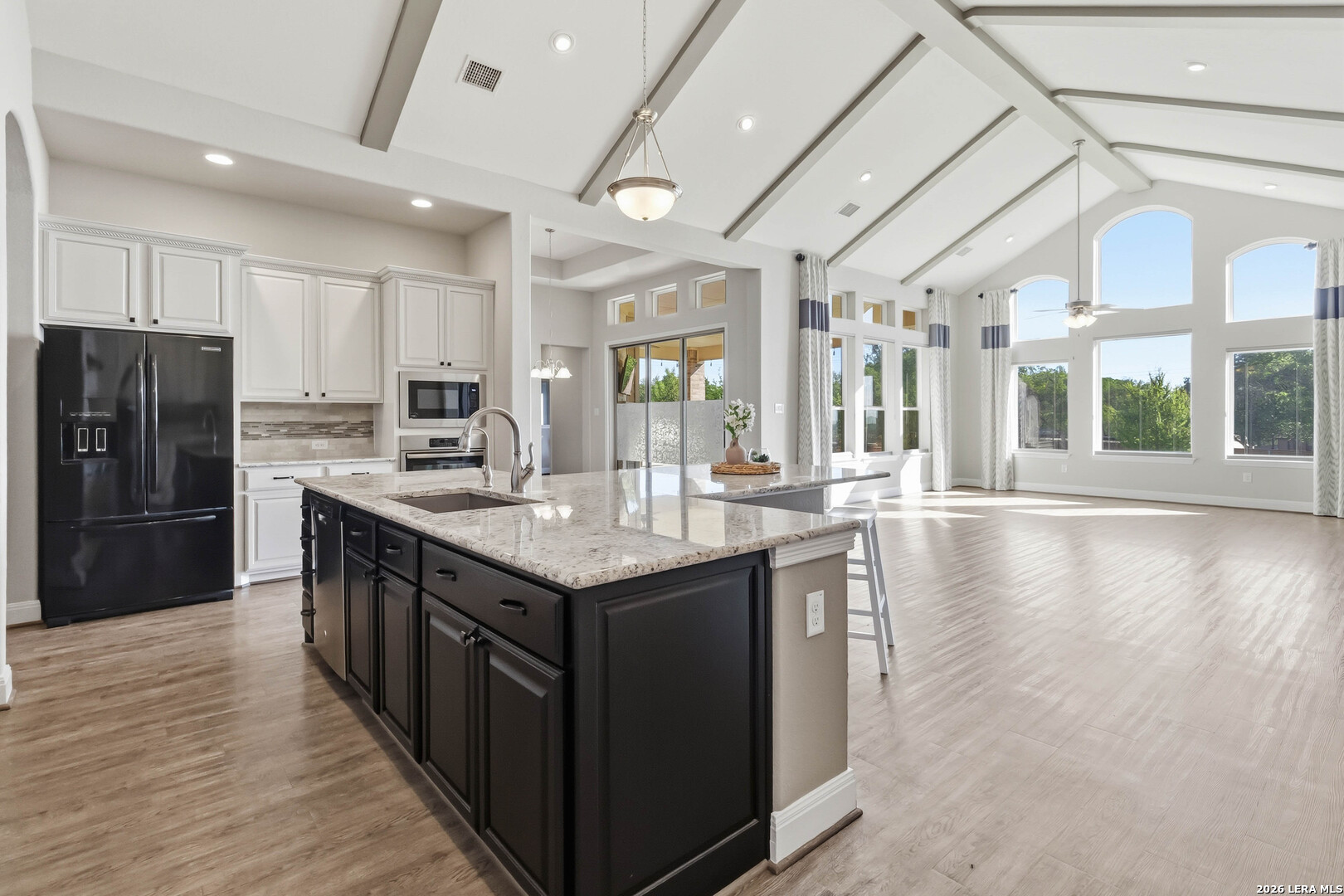 3337 Harvest View Marion, TX 78124 - Photo 5 of 39 a kitchen with stainless steel appliances granite countertop a stove and refrigerator